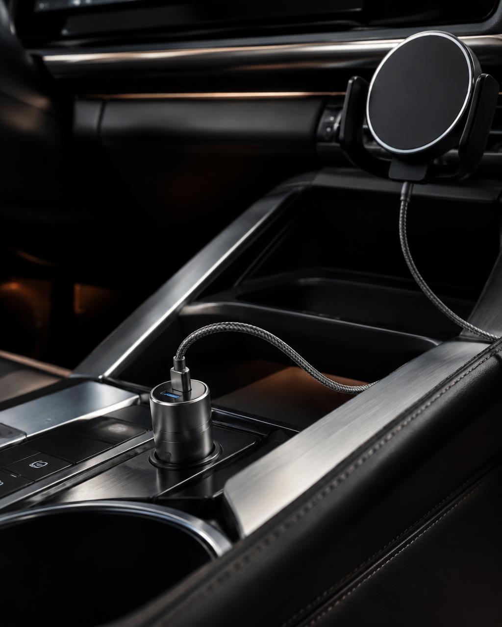 Charging accessories beside a car console
