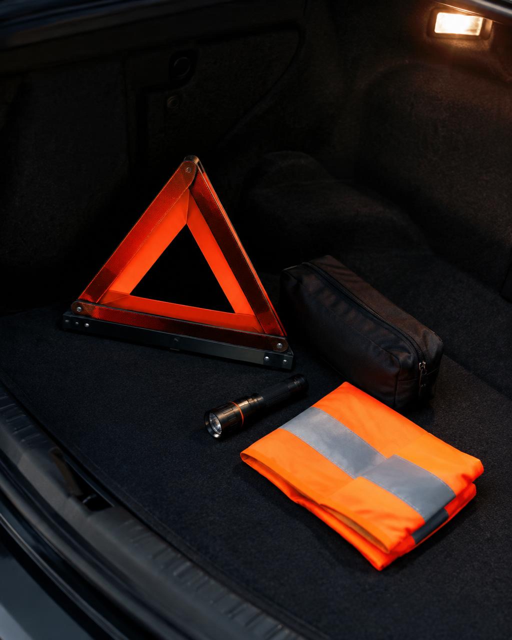 Warning triangle, torch and roadside equipment