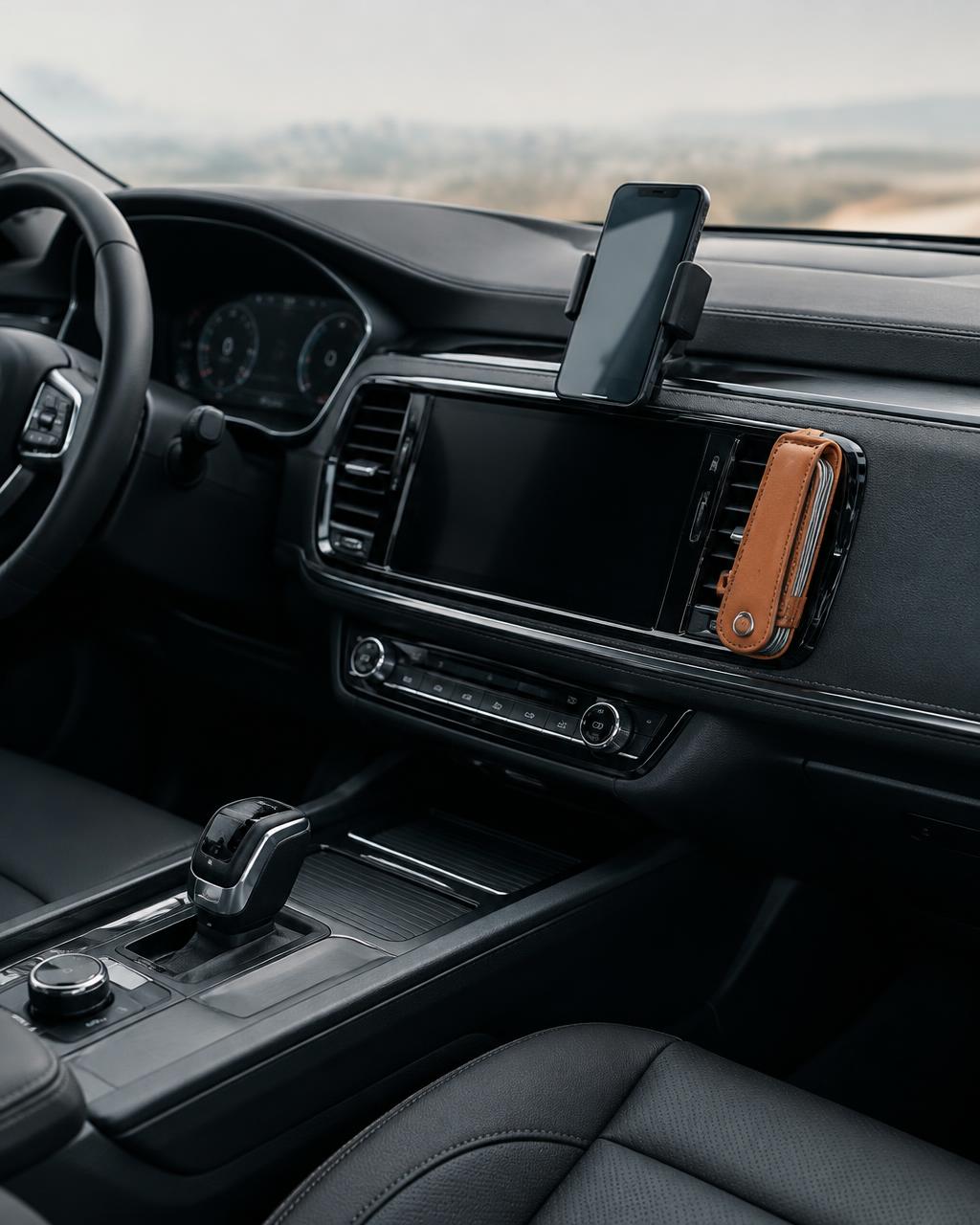 Practical accessories beside a car centre console